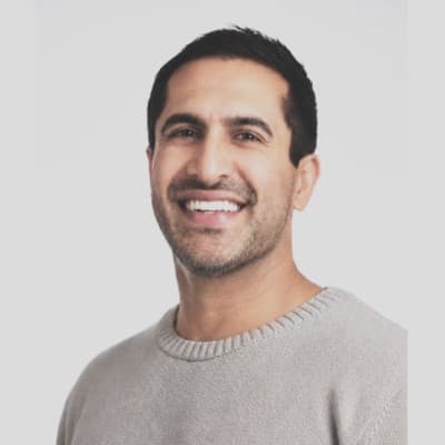 Katen Johal, VP of Sales, smiles at the camera.